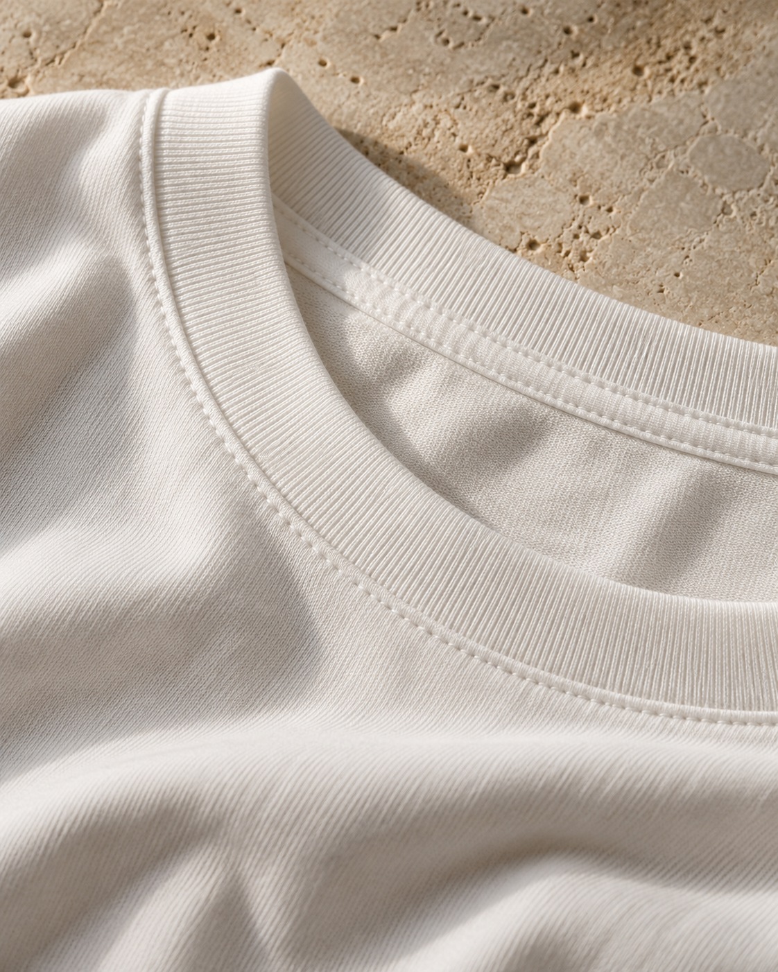 Design study of white cotton knit and a crewneck seam